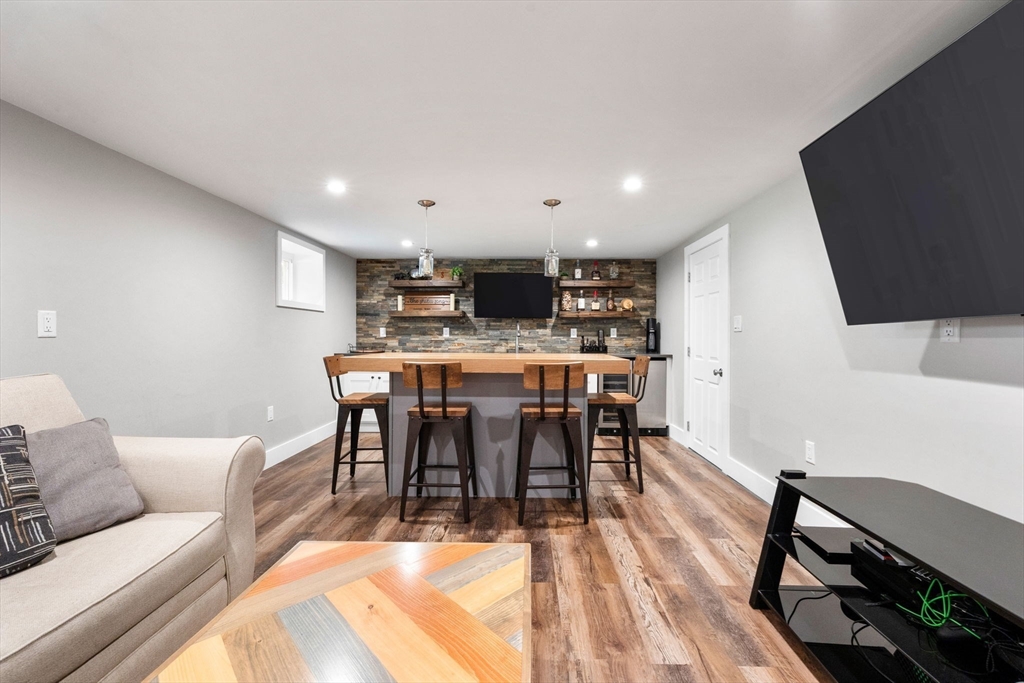 10 Marie Avenue Stoneham, MA 02180 - Photo 26 of 41 a view of a dining room with furniture
