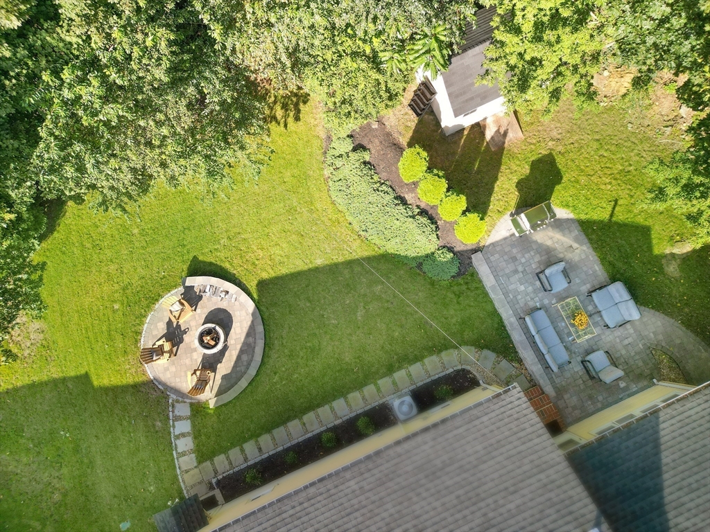 10 Marie Avenue Stoneham, MA 02180 - Photo 33 of 41 a view of swimming pool with a table and chairs