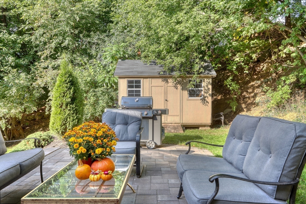 10 Marie Avenue Stoneham, MA 02180 - Photo 35 of 41 a view of backyard with outdoor seating and plants