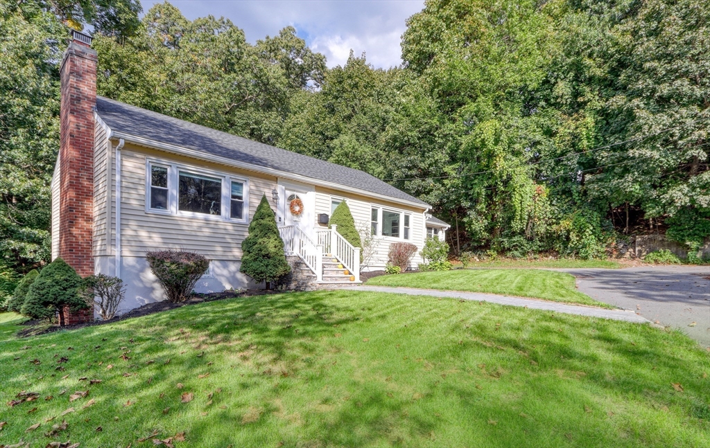 10 Marie Avenue Stoneham, MA 02180 - Photo 41 of 41 a view of a house with backyard and a large tree