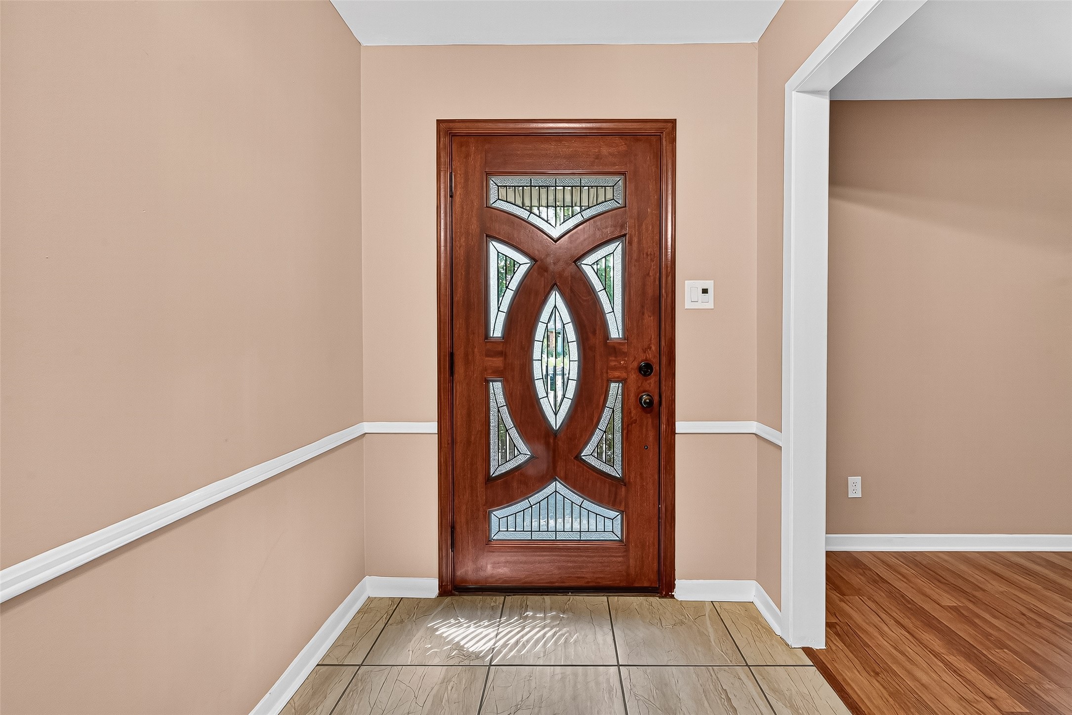 5734 Sanford Road Houston, TX 77096 - Photo 16 of 48 a wooden door with a view of front door