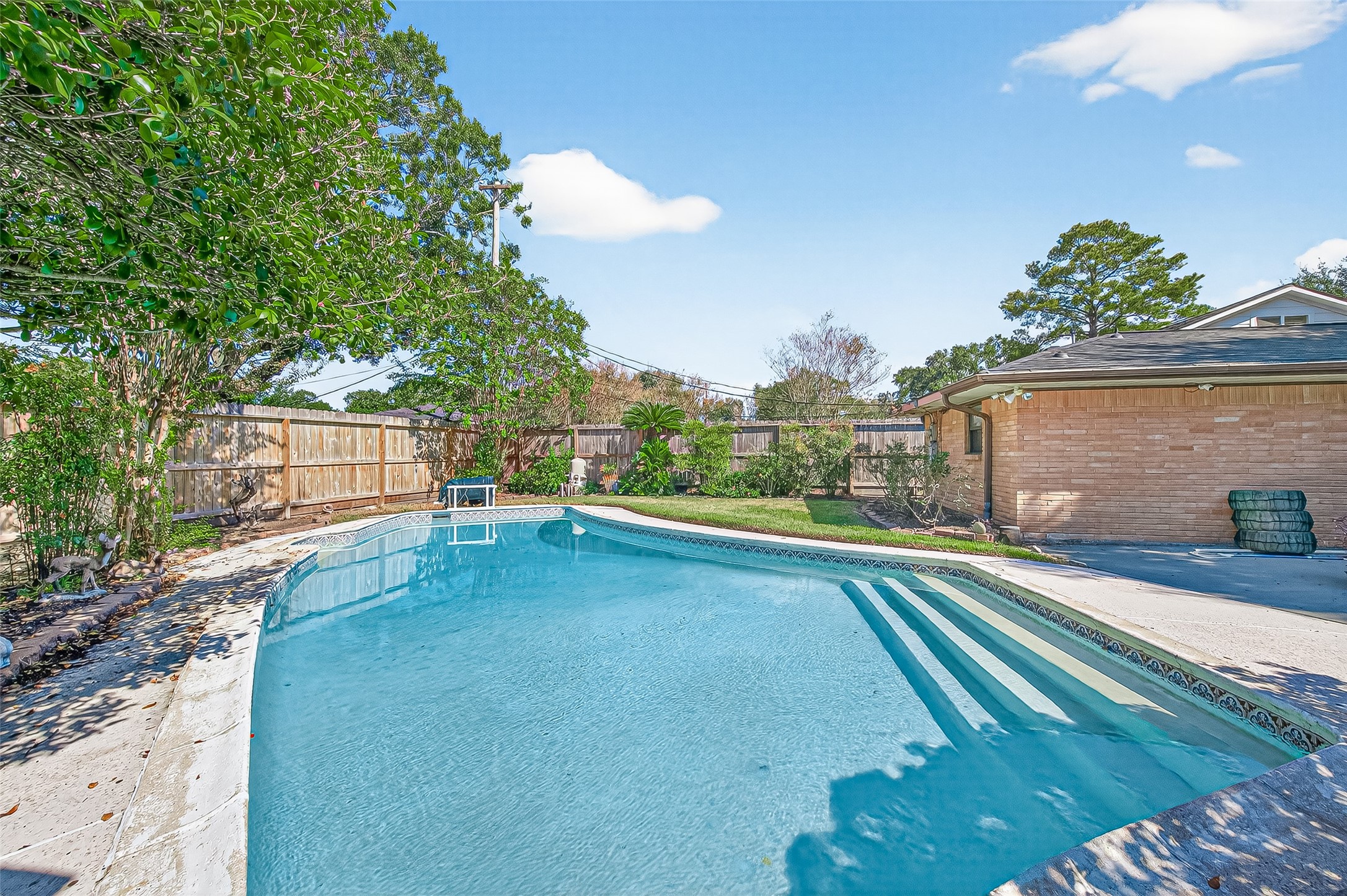 5734 Sanford Road Houston, TX 77096 - Photo 39 of 48 a view of a house with a yard