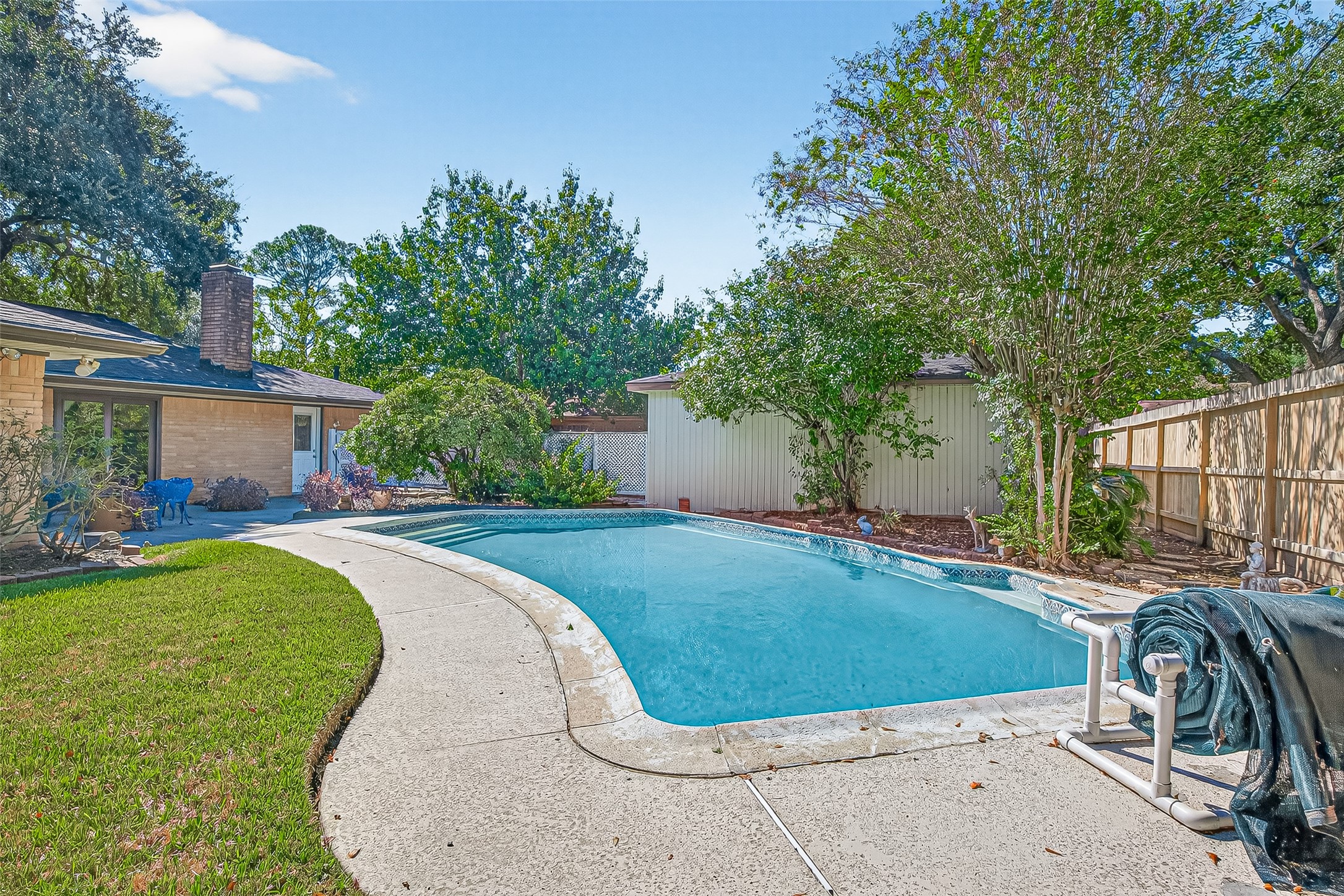 5734 Sanford Road Houston, TX 77096 - Photo 43 of 48 a view of a backyard with a patio