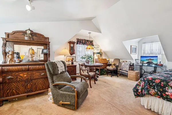 a living room with furniture and a couch