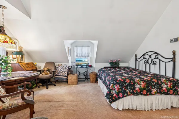 a bedroom with bed or furniture and a window