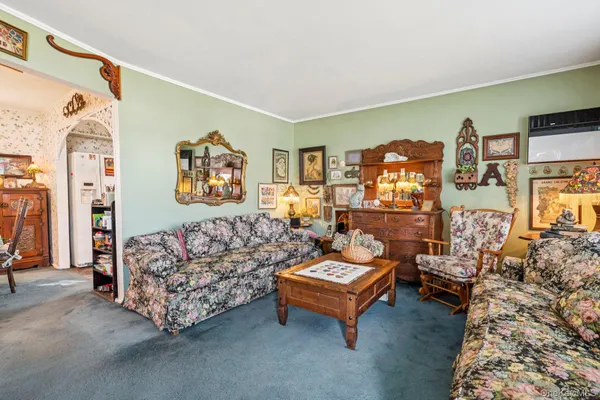 a living room with furniture and a couch