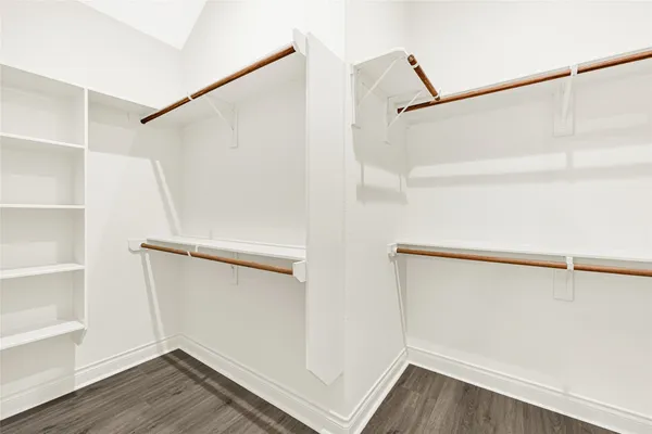 a view of an empty walk in closet