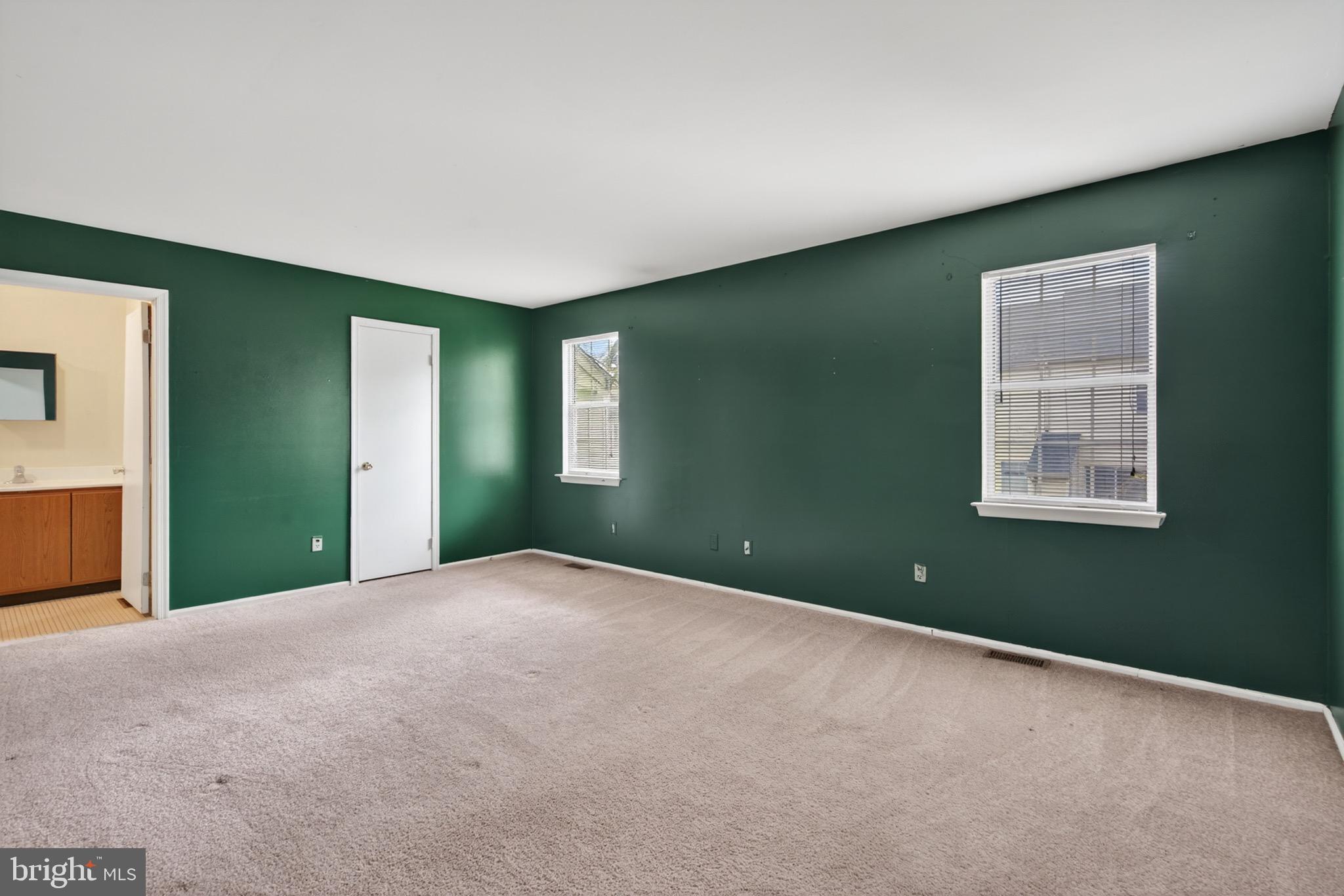 228 Goshen Road Schwenksville, PA 19473 - Photo 7 of 14 a view of an empty room with window and closet area