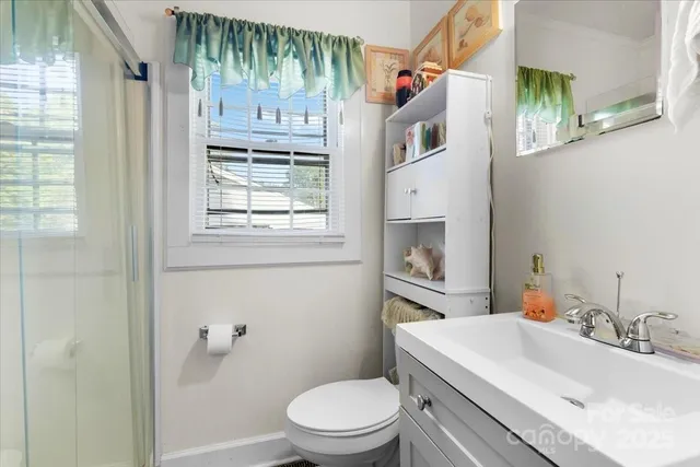 a bathroom with a sink toilet and tub