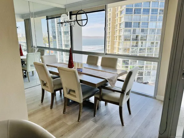 a kitchen with stainless steel appliances a stove a refrigerator and a microwave