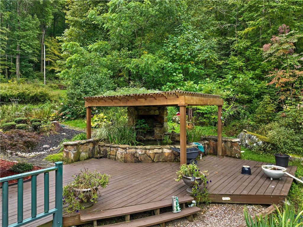 109 Fire Tower Road Confluence, PA 15424 - Photo 24 of 29 an outdoor space with furniture and umbrella