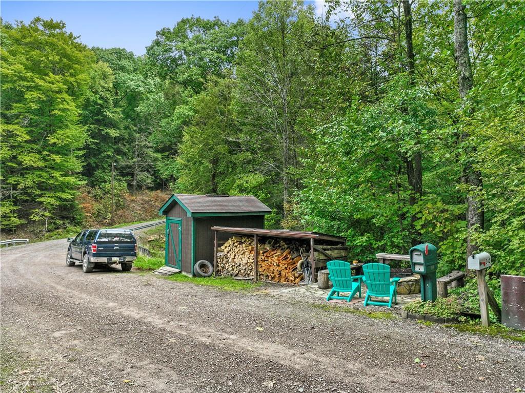 109 Fire Tower Road Confluence, PA 15424 - Photo 27 of 29 a view of a house with truck parked on the road