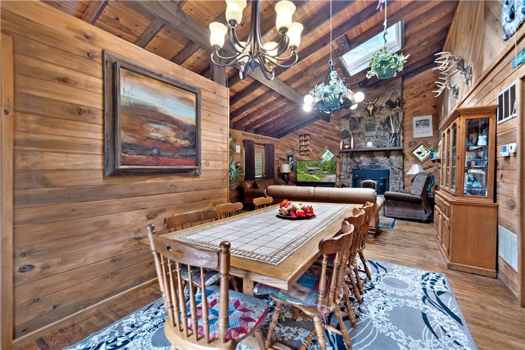 109 Fire Tower Road Confluence, PA 15424 - Photo 10 of 29 a view of a patio with table and chairs with wooden floor and fence