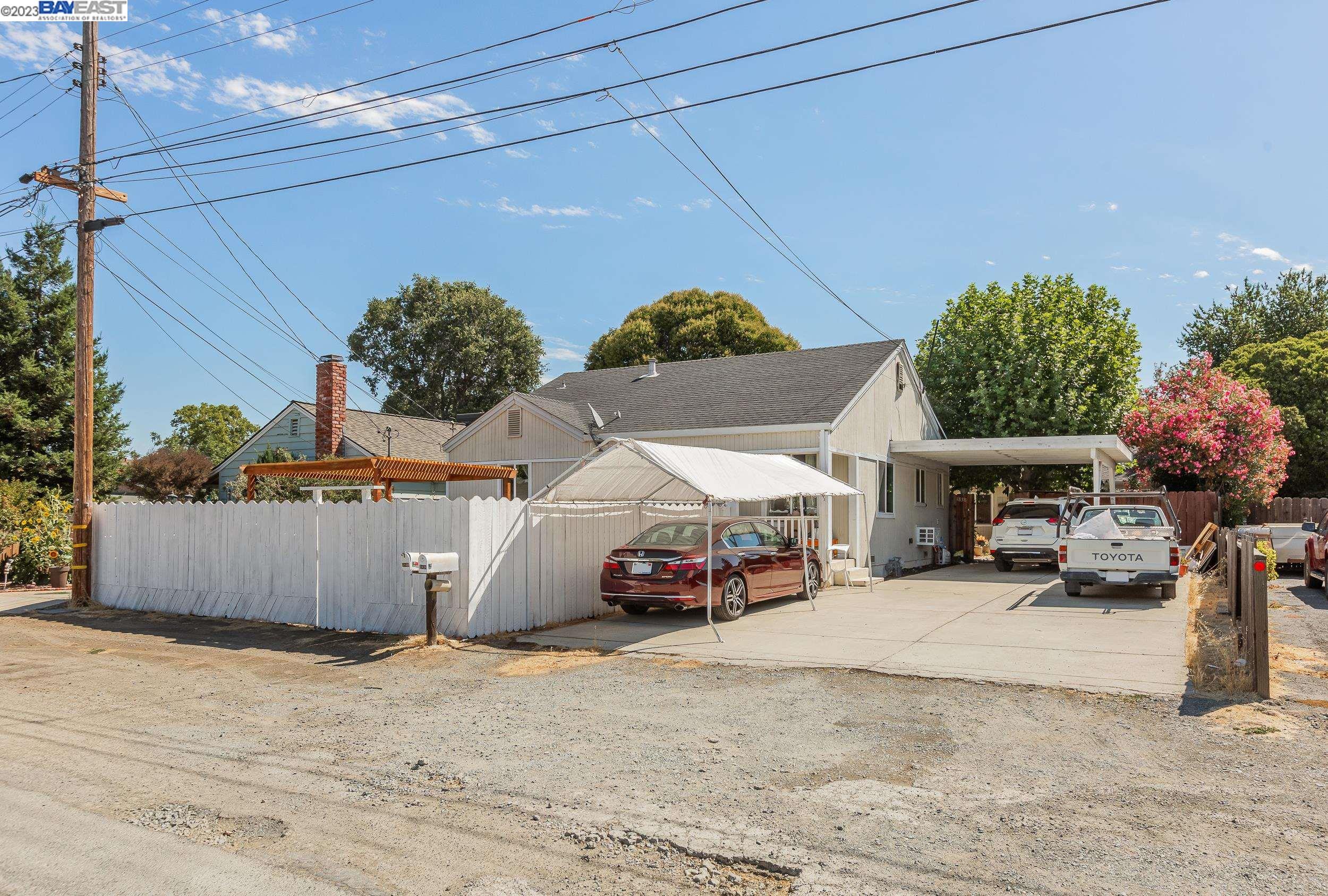 a car parked in front of a house