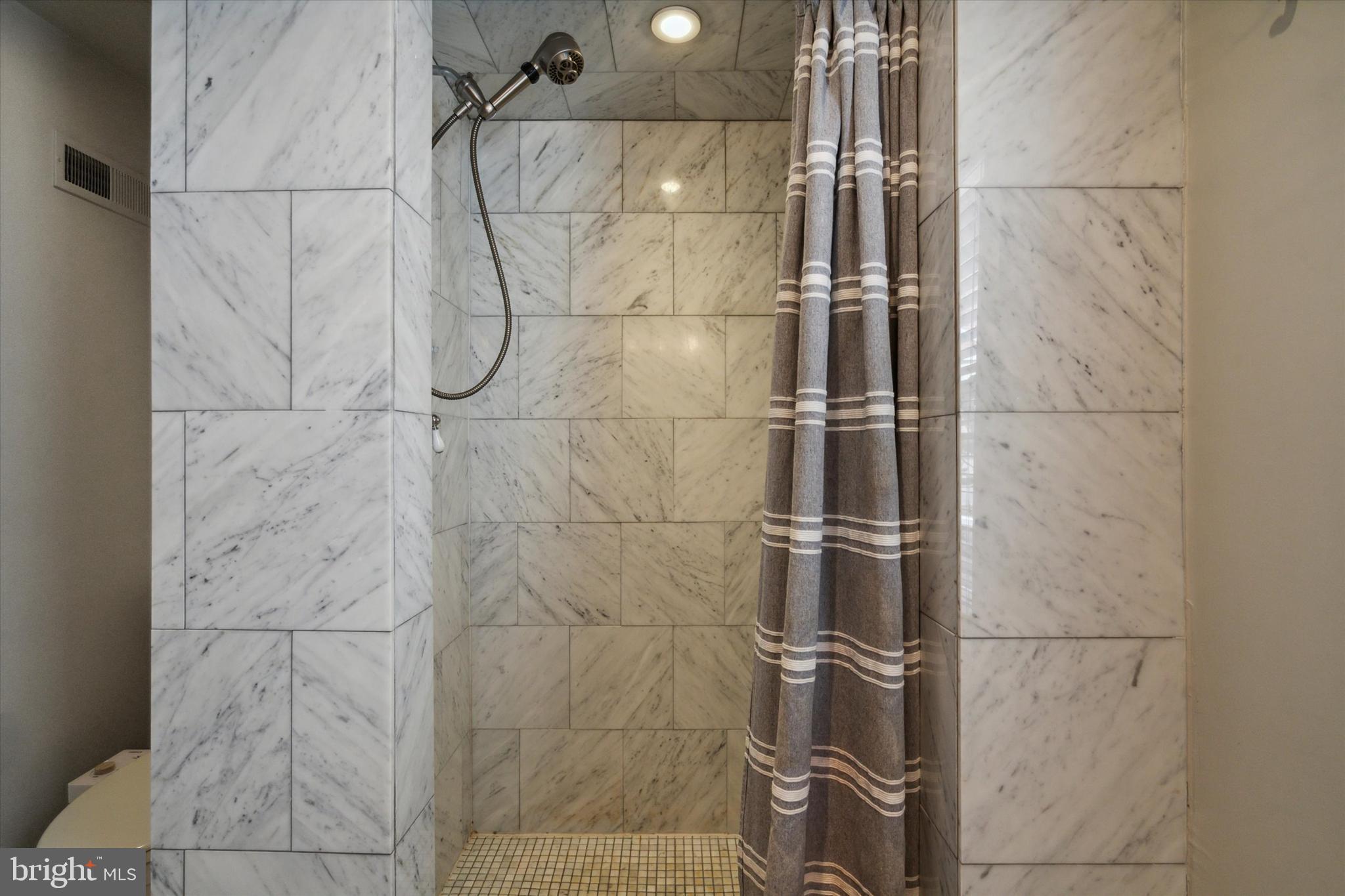 1640 Waverly Street Philadelphia, PA 19146 - Photo 10 of 16 a bathroom with a shower