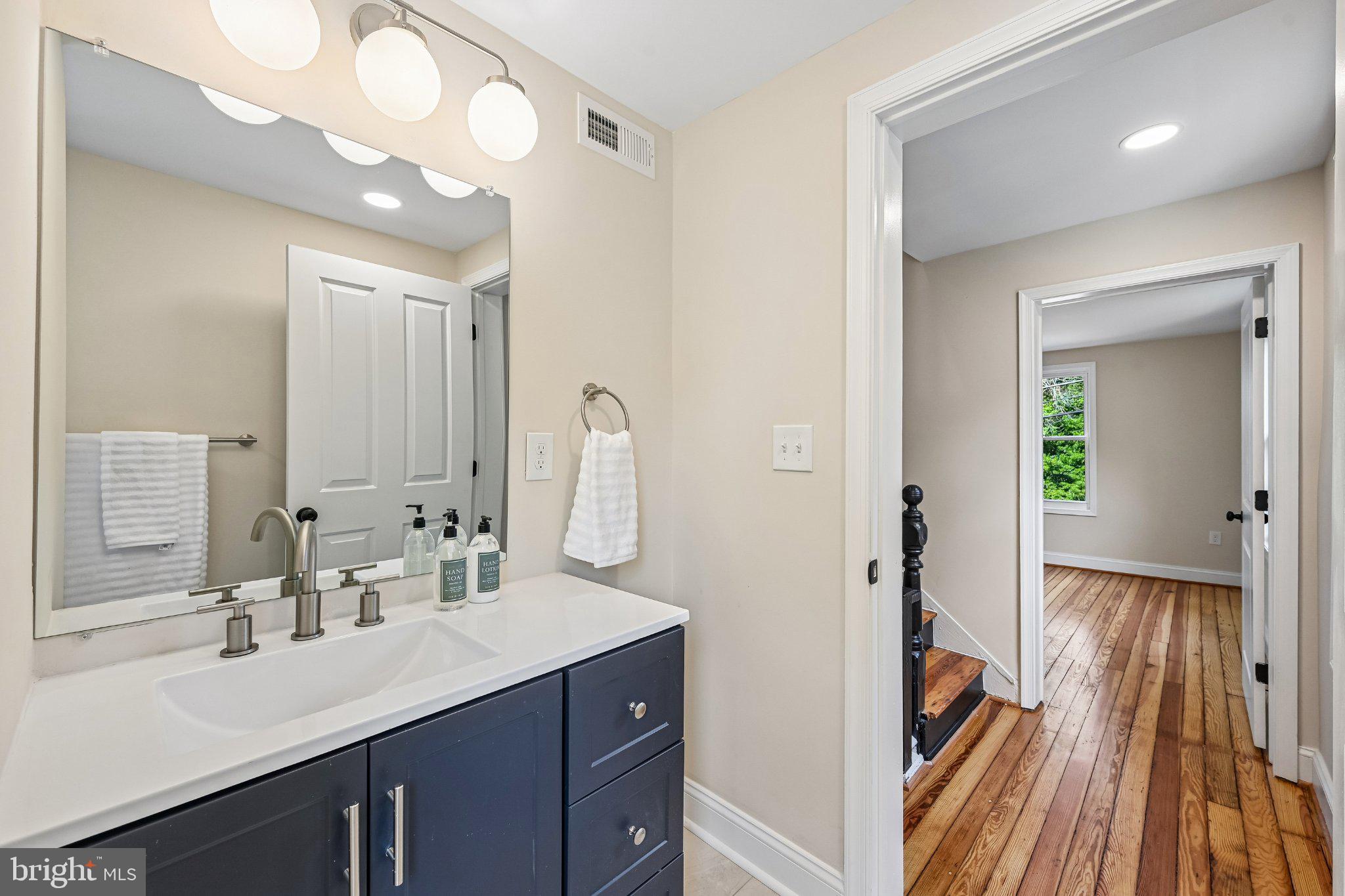 5714 Rusk Avenue Baltimore, MD 21215 - Photo 21 of 51 Modern bathroom with sleek finishes.