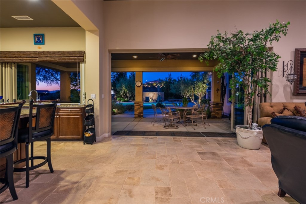 845 Alpine Meadows Lane Riverside, CA 92506 - Photo 13 of 57 a view of a chairs and tables in the patio