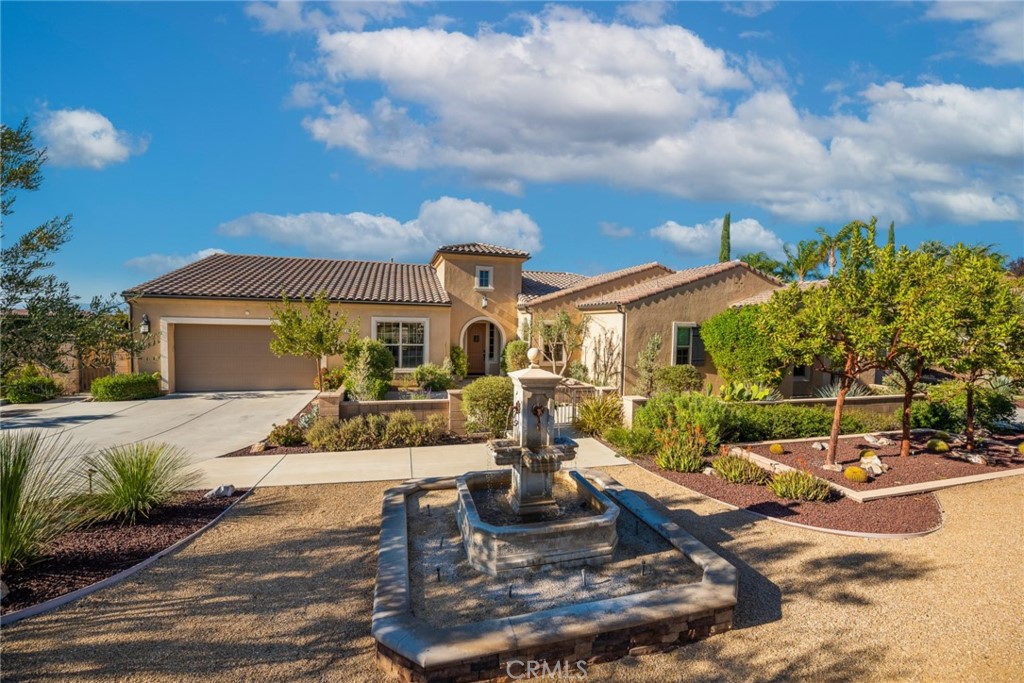 845 Alpine Meadows Lane Riverside, CA 92506 - Photo 2 of 57 a view of a house with backyard and sitting area