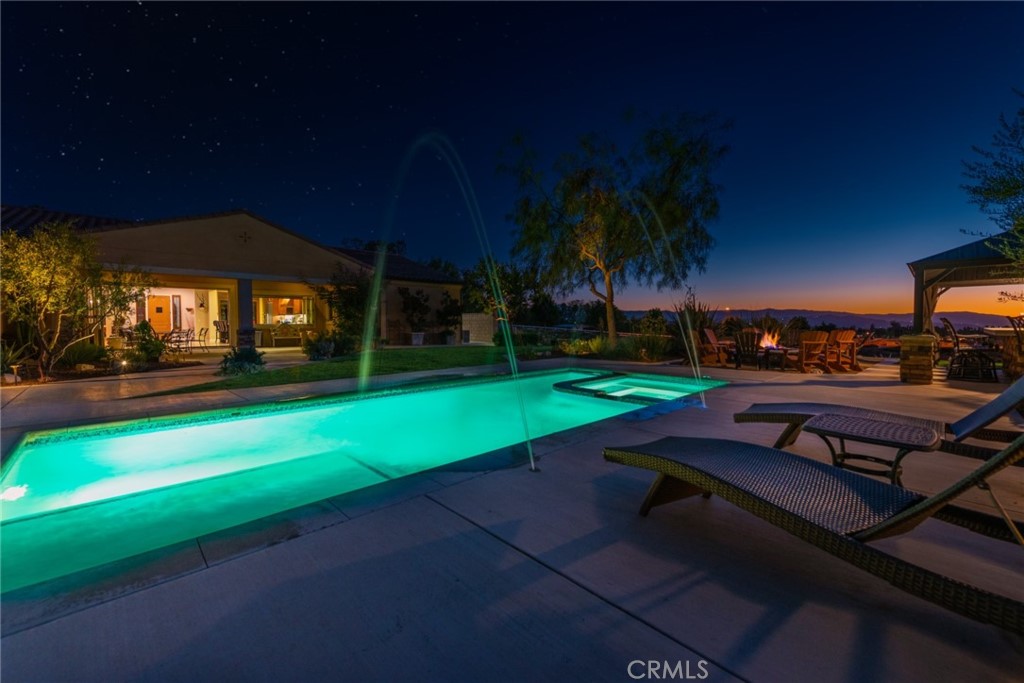 845 Alpine Meadows Lane Riverside, CA 92506 - Photo 23 of 57 a view of a backyard with a garden