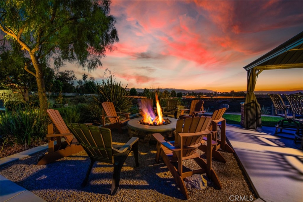 845 Alpine Meadows Lane Riverside, CA 92506 - Photo 24 of 57 a view of a roof deck with chair and table