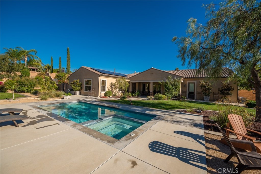 845 Alpine Meadows Lane Riverside, CA 92506 - Photo 28 of 57 a front view of house with yard and outdoor seating