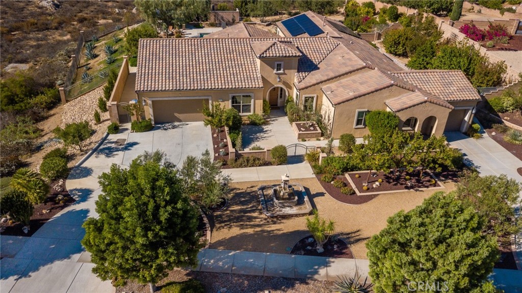 845 Alpine Meadows Lane Riverside, CA 92506 - Photo 3 of 57 an aerial view of a house with a yard and lake view