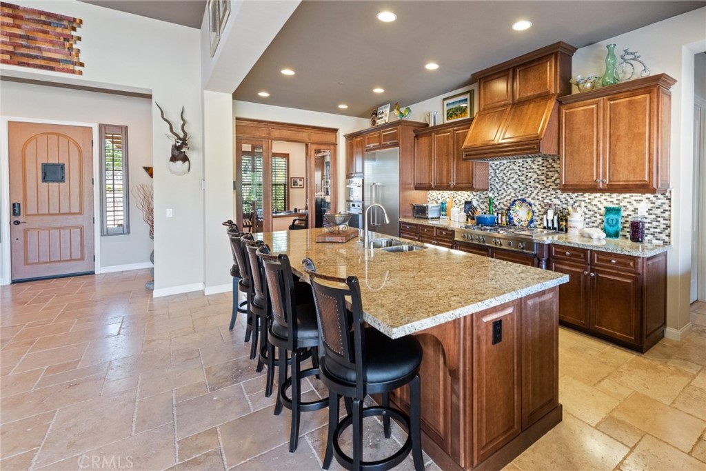 845 Alpine Meadows Lane Riverside, CA 92506 - Photo 42 of 57 a dining table with chairs and window