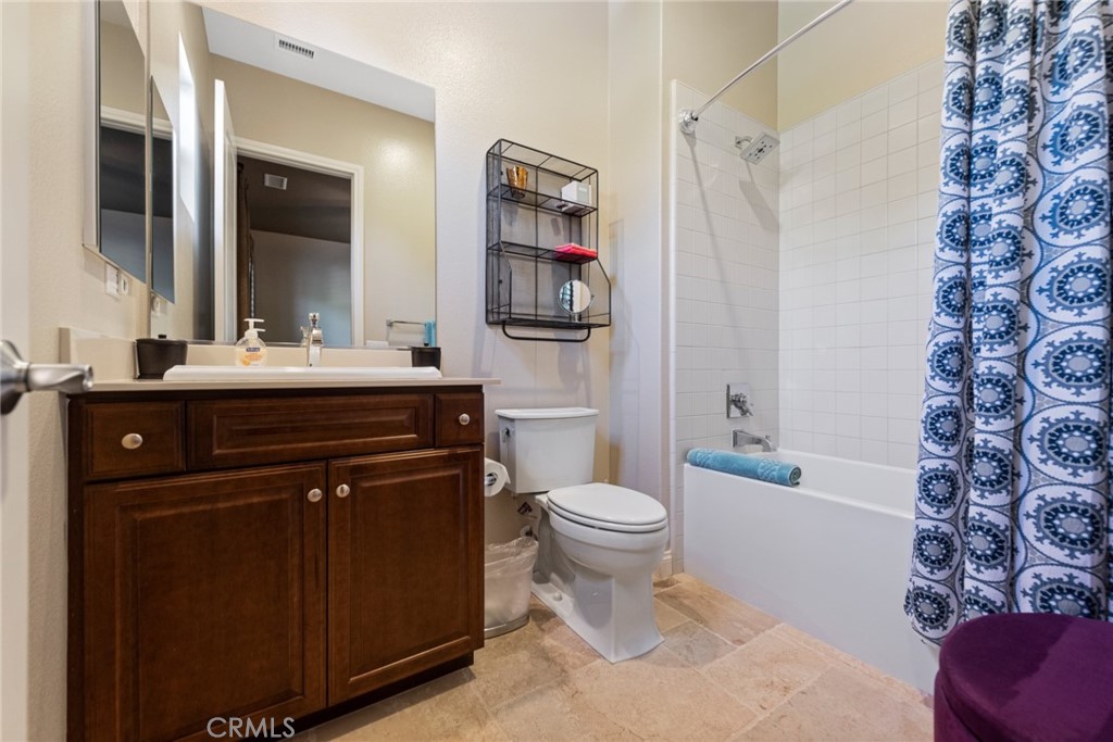 845 Alpine Meadows Lane Riverside, CA 92506 - Photo 51 of 57 a bathroom with a sink a toilet and shower
