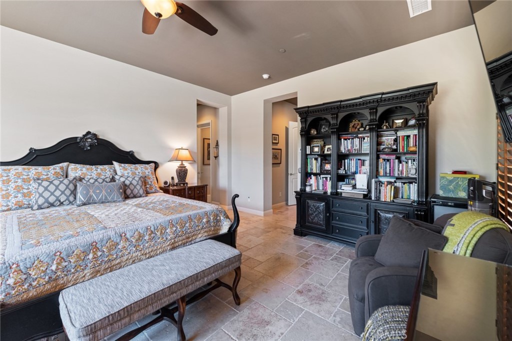 845 Alpine Meadows Lane Riverside, CA 92506 - Photo 57 of 57 a bedroom with a bed couch and a large window