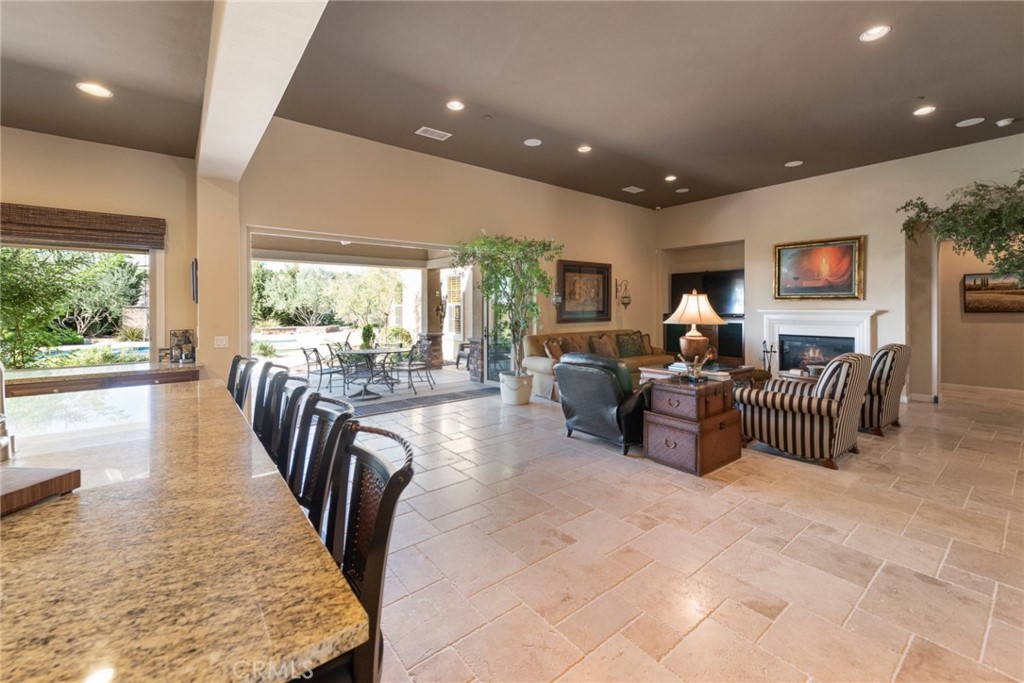 845 Alpine Meadows Lane Riverside, CA 92506 - Photo 10 of 57 a living room with furniture and a large window