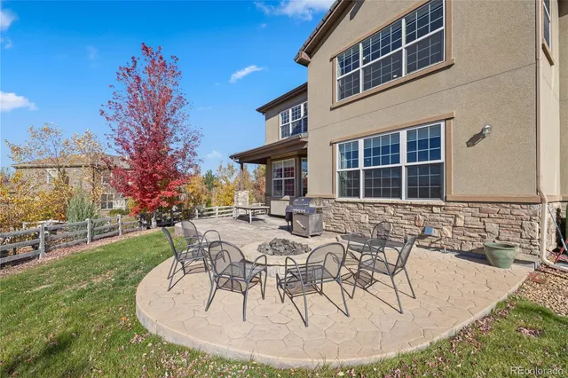 a bathroom with a double vanity sink toilet and shower
