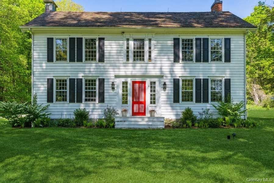 1141 Beekman Road Hopewell Junction, NY 12533 - Photo 1 of 36 a front view of house with yard and outdoor seating
