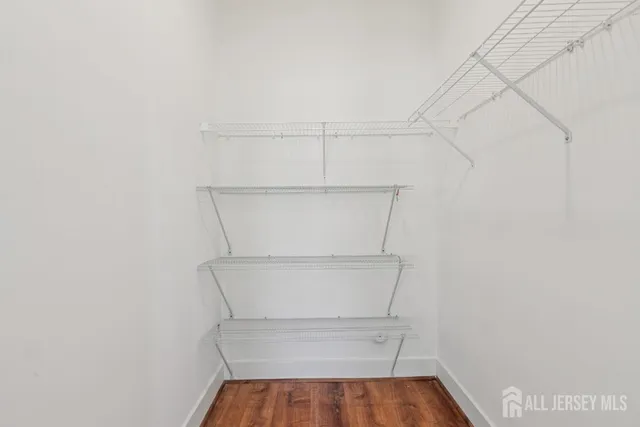 a view of storage and utility room with empty racks