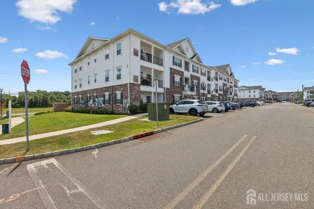 a view of a building with a big yard