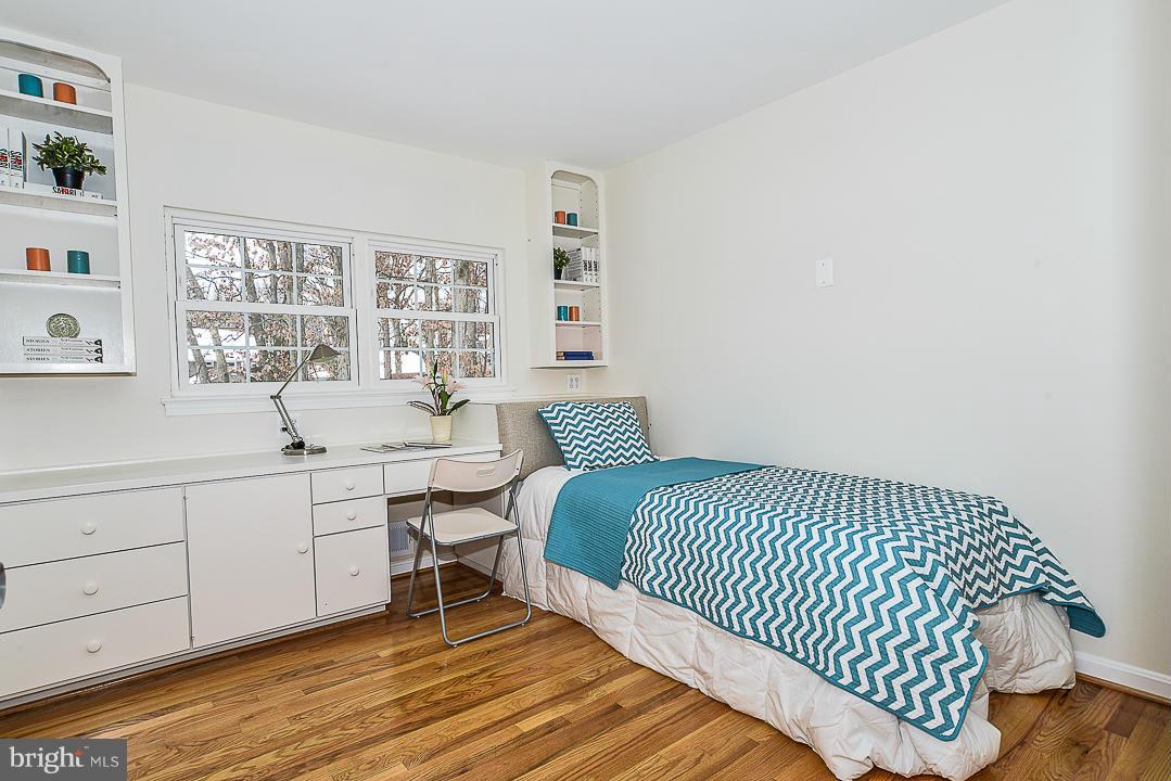 6106 Roxbury Avenue Springfield, VA 22152 - Photo 22 of 29 a spacious bedroom with a bed and window