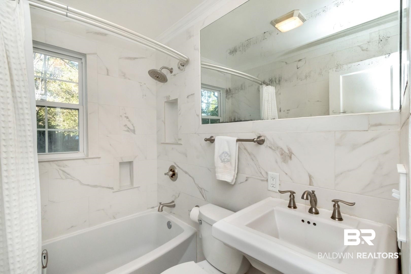 16 Princess Anne Road Mobile, AL 36608 - Photo 25 of 40 Full bath with shower / bathtub combination with curtain, tile walls, and crown molding
