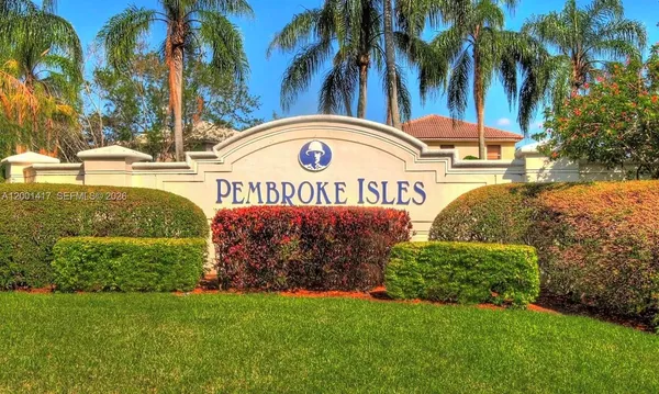 a view of a sign board with a big yard