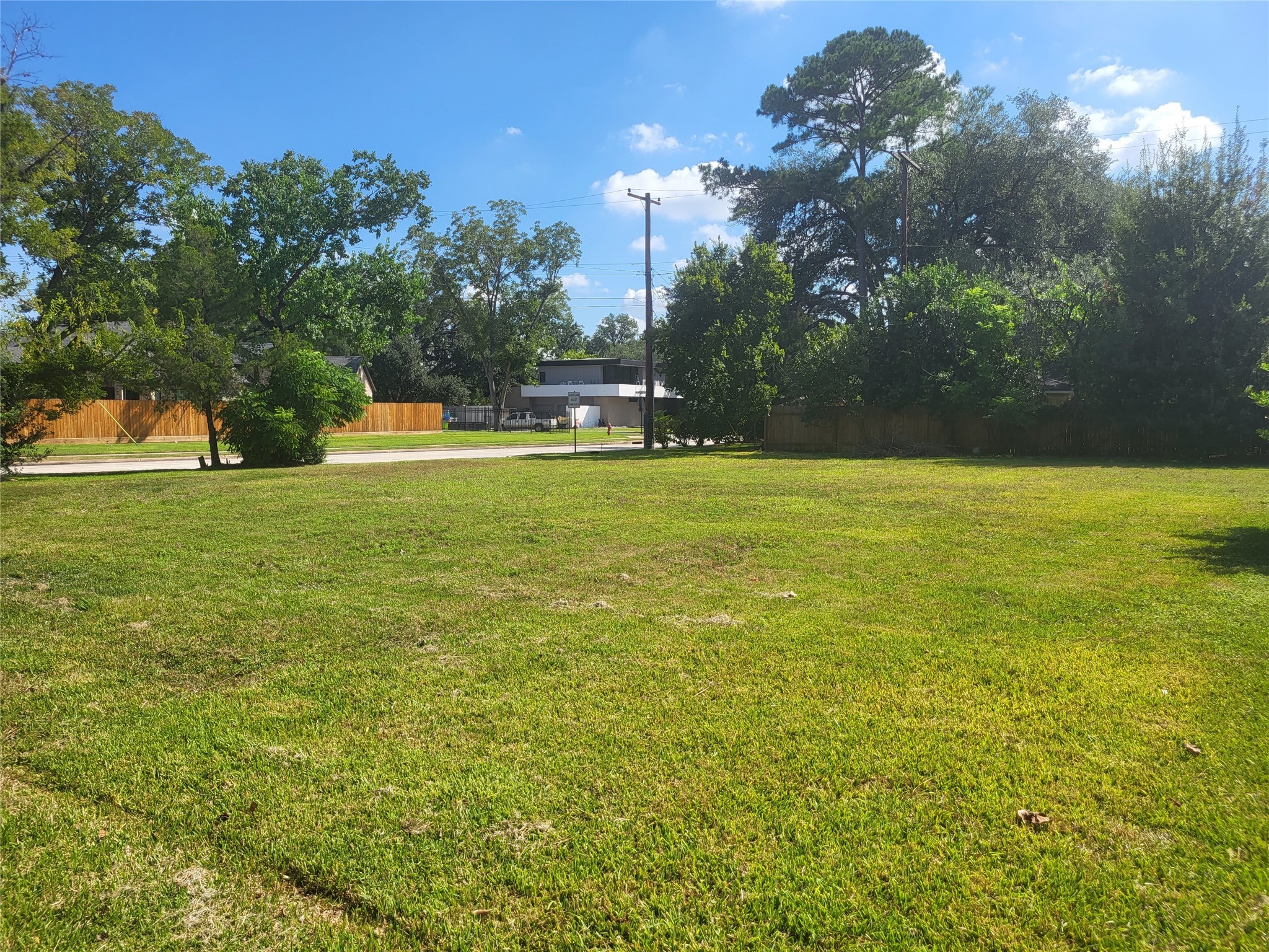 a view of a swimming pool with an outdoor space and seating area
