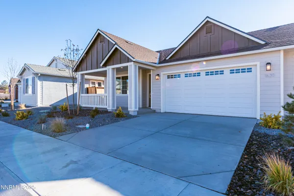 a kitchen with a stove and a refrigerator