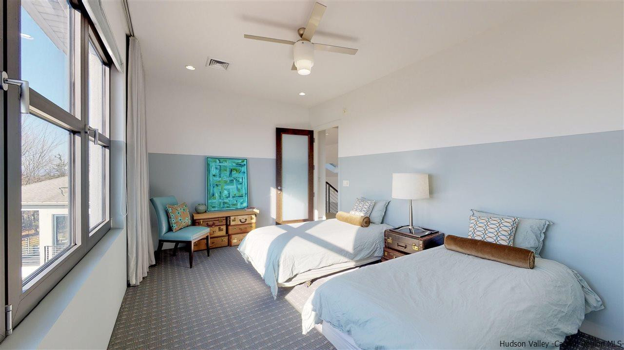 44 Willow Brook Road, Unit 3 799 000 Stanford, NY 12514 - Photo 15 of 18 a bed room with two beds and a large window