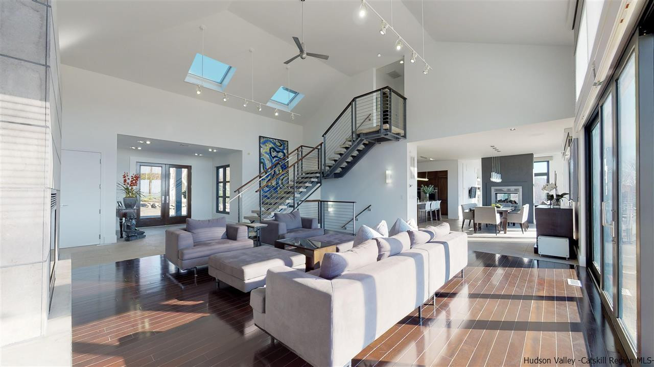 44 Willow Brook Road, Unit 3 799 000 Stanford, NY 12514 - Photo 4 of 18 a living room with furniture and wooden floor
