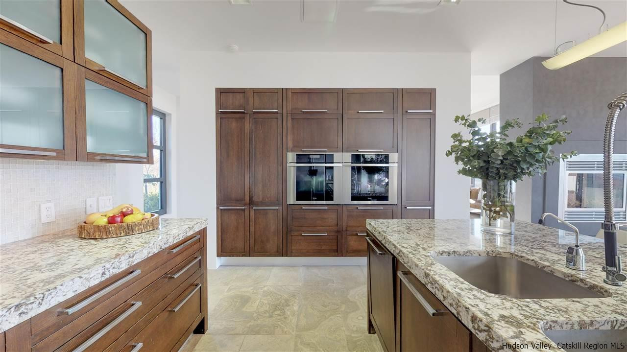 44 Willow Brook Road, Unit 3 799 000 Stanford, NY 12514 - Photo 7 of 18 a kitchen with granite countertop a sink and cabinets