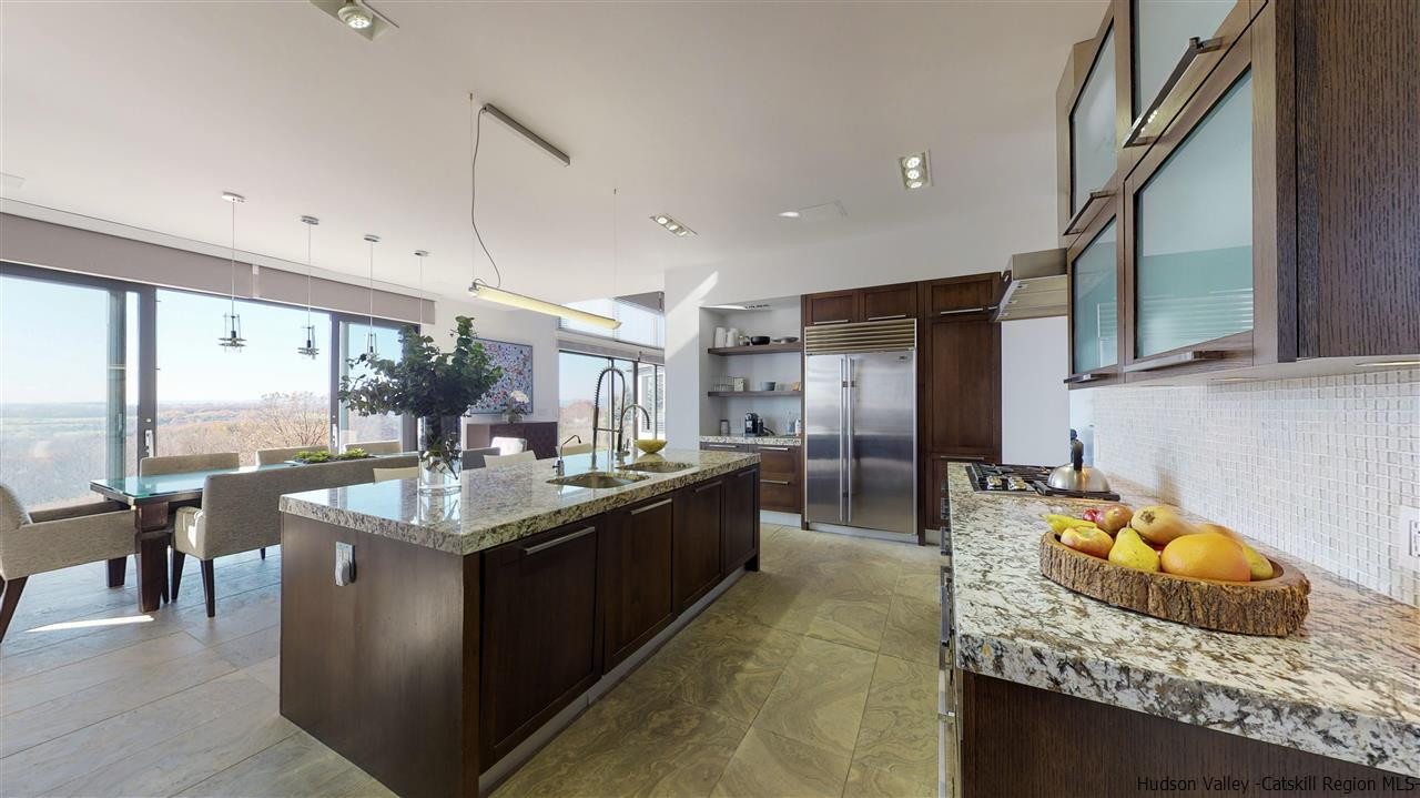 44 Willow Brook Road, Unit 3 799 000 Stanford, NY 12514 - Photo 9 of 18 a kitchen with stainless steel appliances granite countertop a lot of counter space