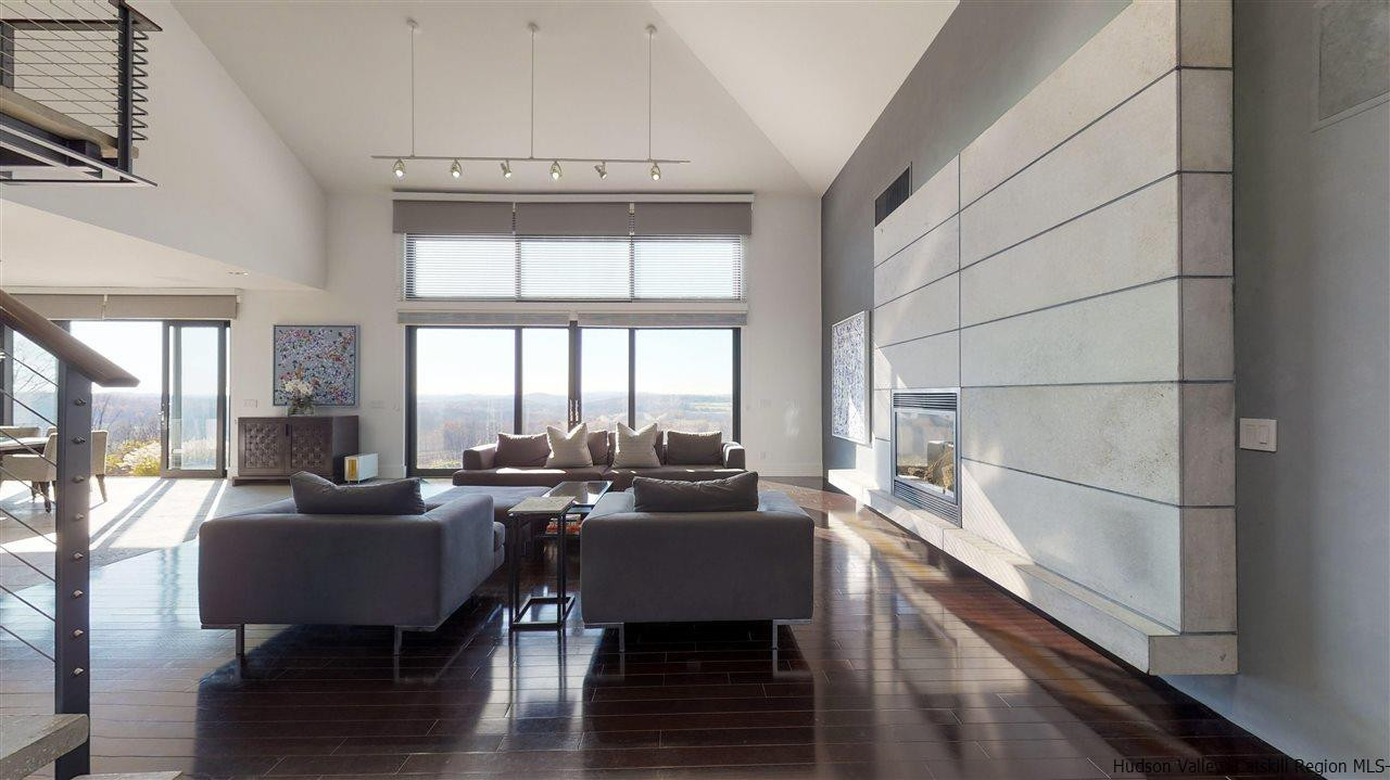44 Willow Brook Road, Unit 3 799 000 Stanford, NY 12514 - Photo 10 of 18 a living room with furniture and a large window