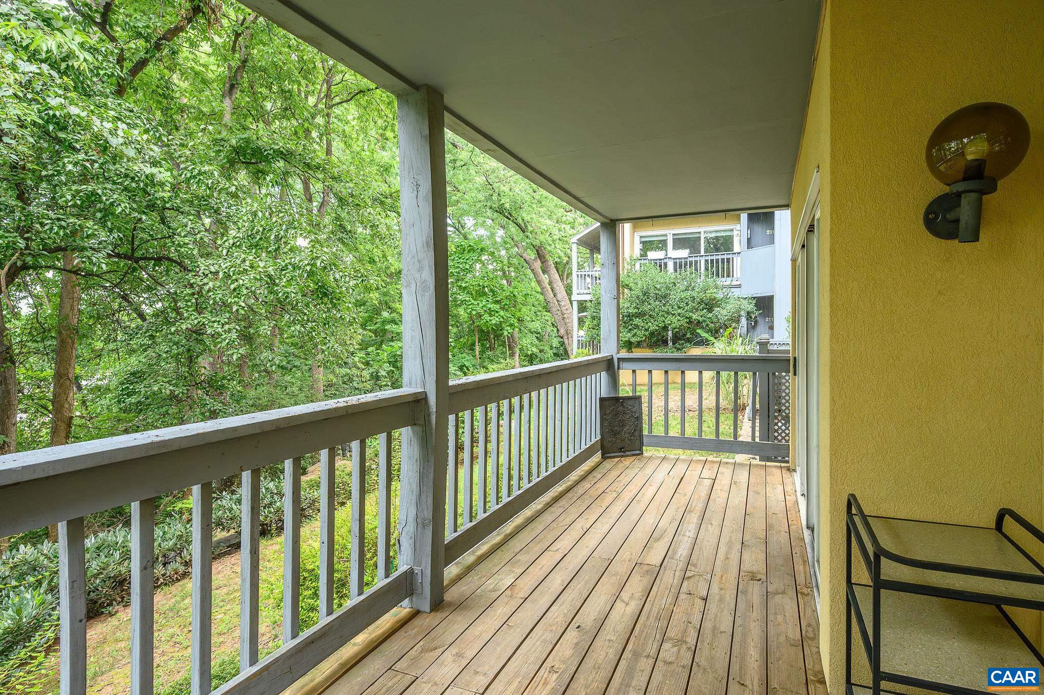 207 2nd Street Northwest, Unit D Charlottesville, VA 22902 - Photo 11 of 18 a view of balcony with wooden floor