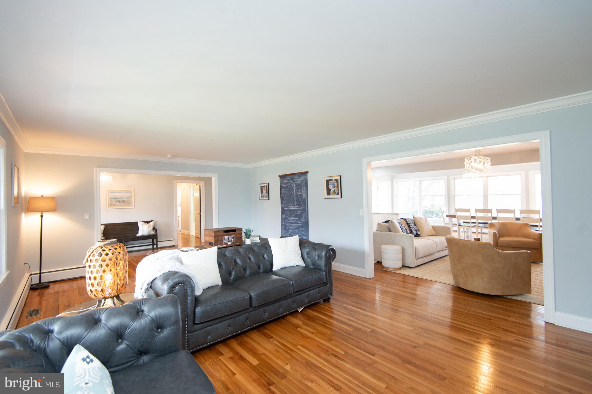 1417 School Street Cambridge, MD 21613 - Photo 14 of 73 a living room with furniture and a large window