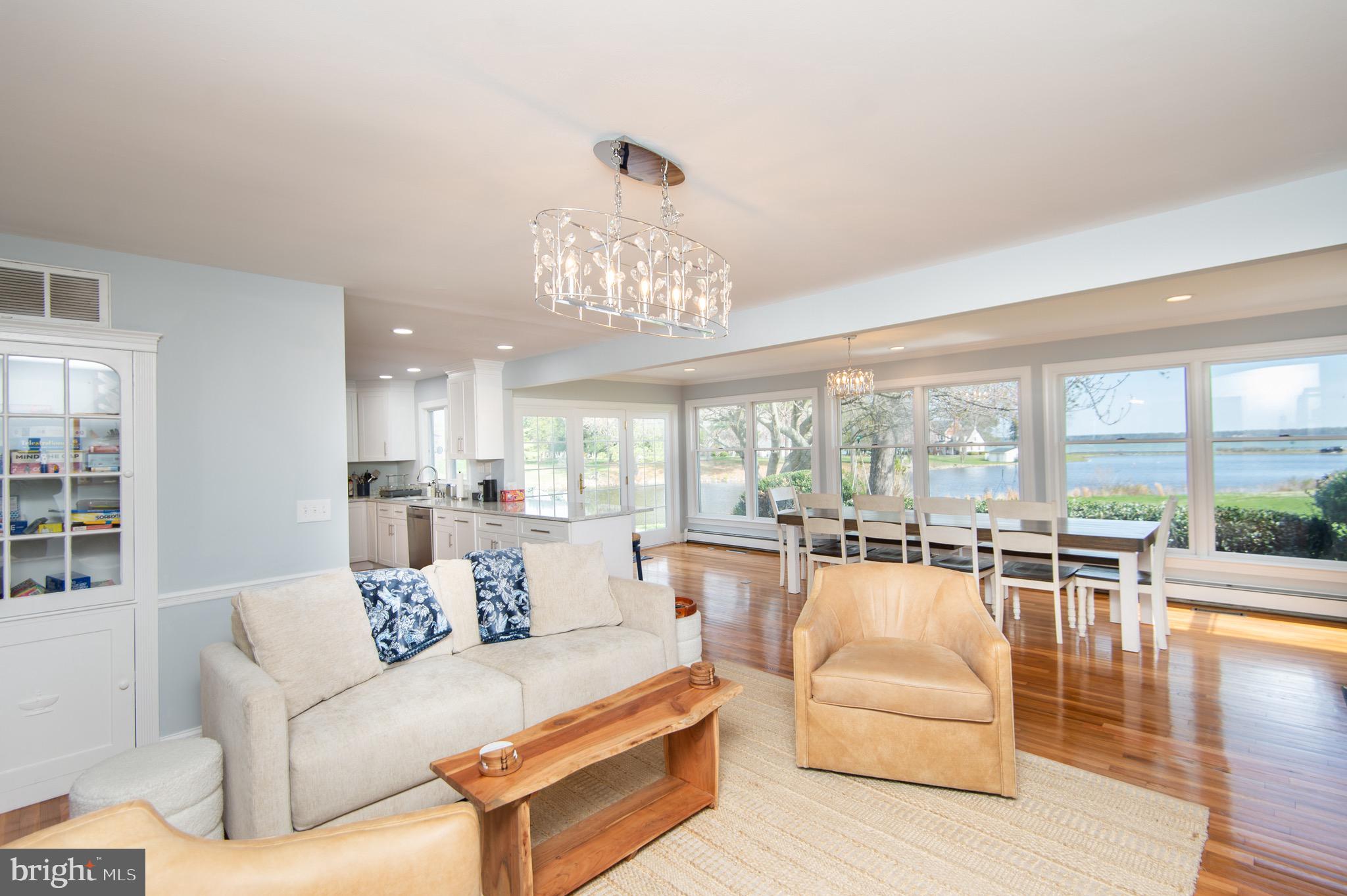 1417 School Street Cambridge, MD 21613 - Photo 15 of 73 a living room with furniture and a large window