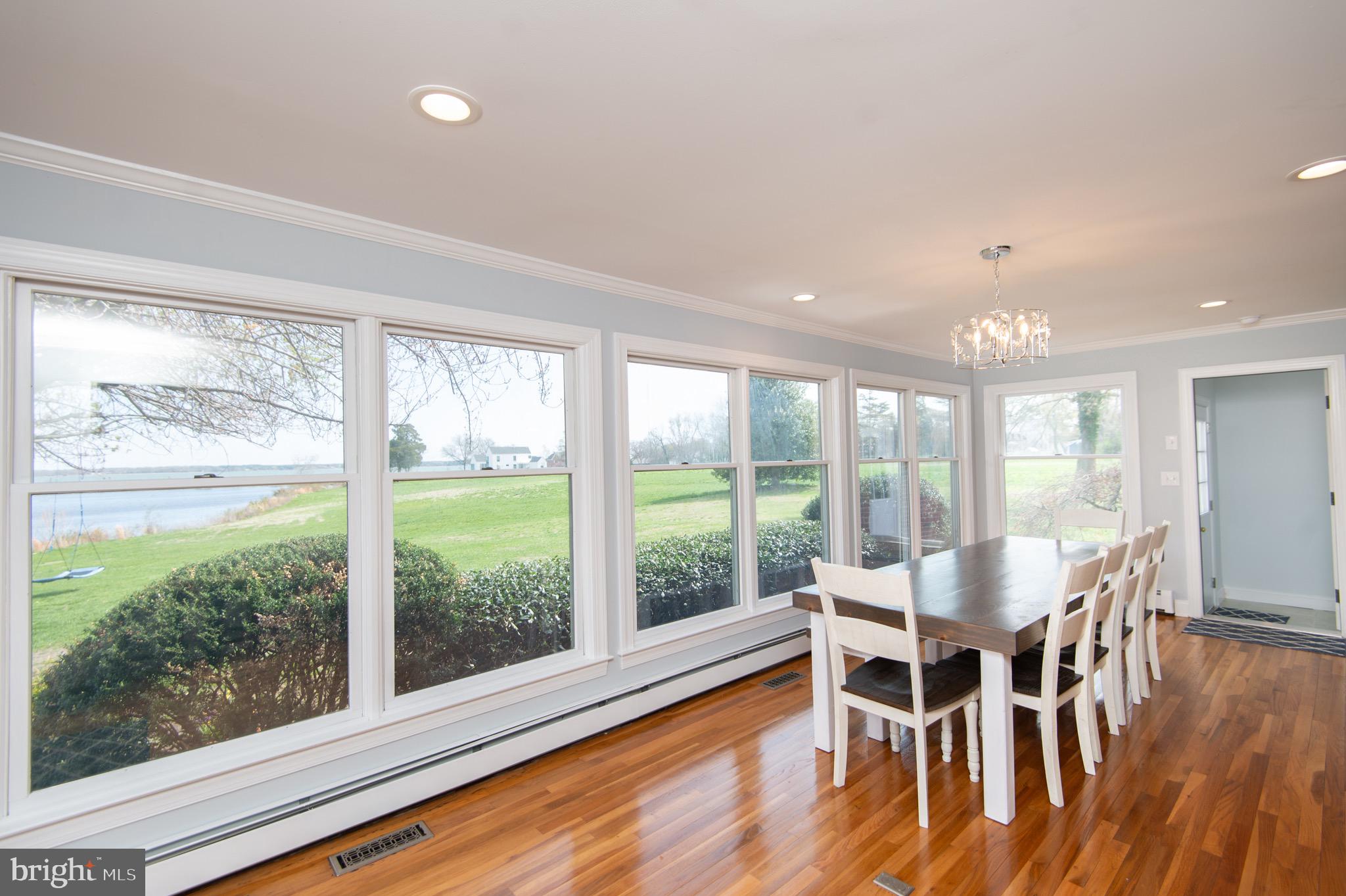 1417 School Street Cambridge, MD 21613 - Photo 24 of 73 a dining room with furniture window and wooden floor