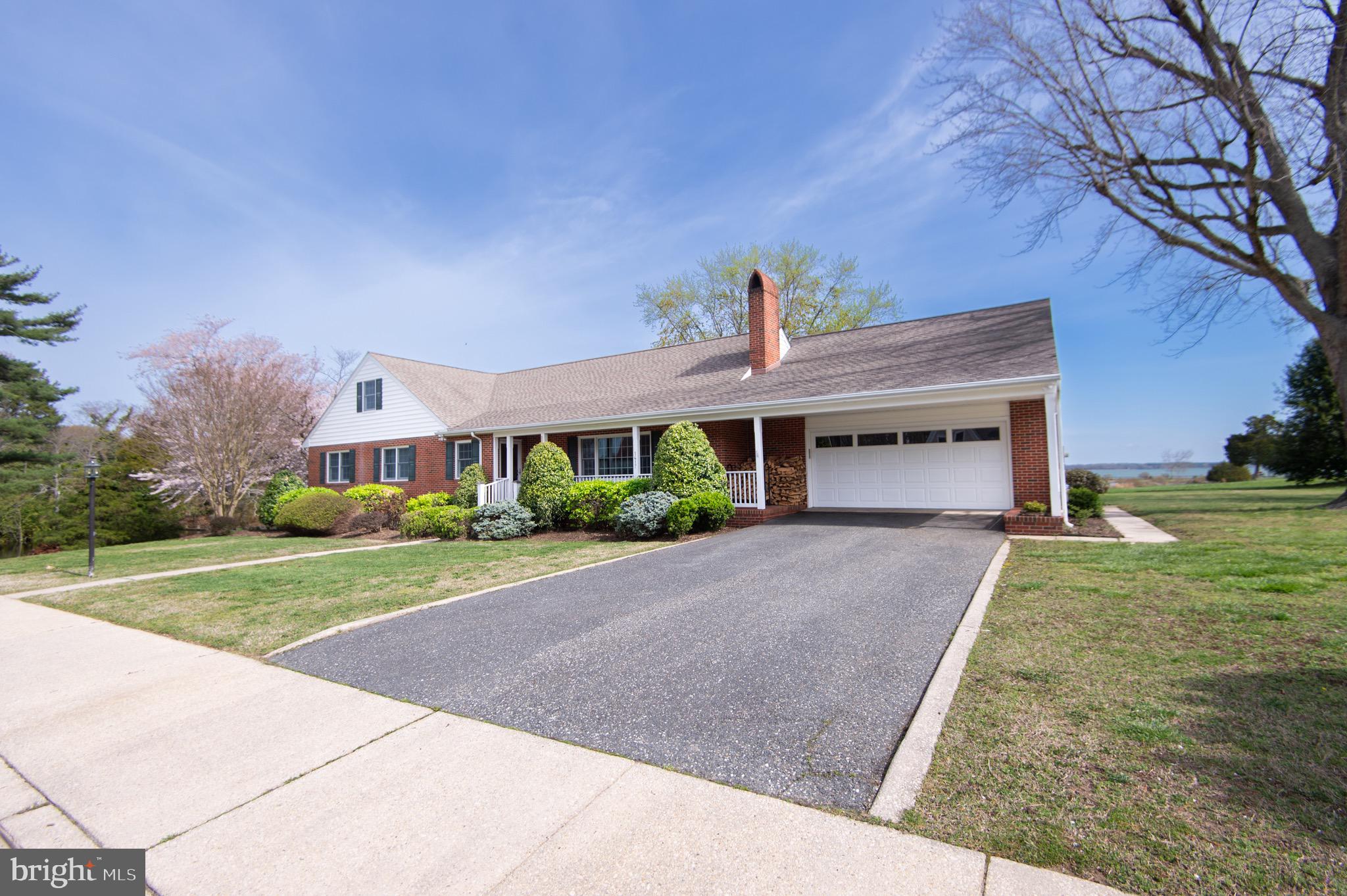 1417 School Street Cambridge, MD 21613 - Photo 3 of 73 a front view of a house with a yard and garage