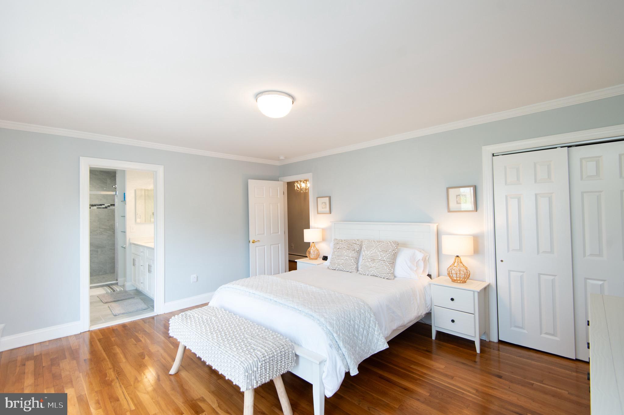 1417 School Street Cambridge, MD 21613 - Photo 33 of 73 a bedroom with a bed and a window